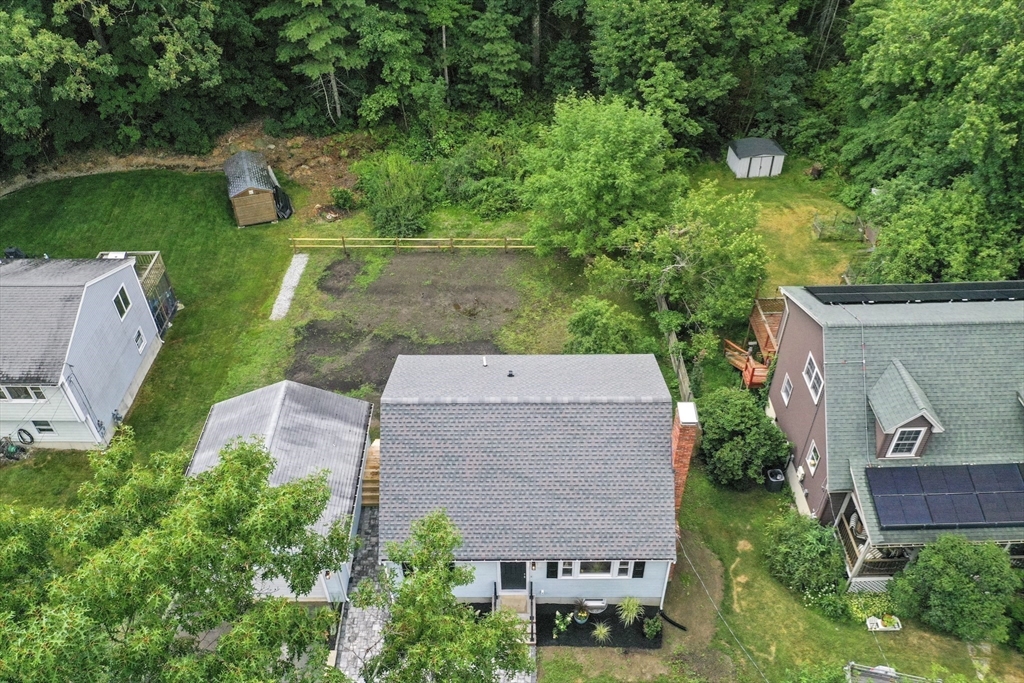 21 Woodside Road Billerica, MA 01862 - Photo 31 of 34 an aerial view of a house with garden space and street view