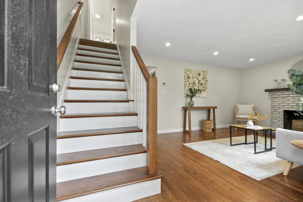 21 Woodside Road Billerica, MA 01862 - Photo 4 of 34 a view of entryway and hall with wooden floor