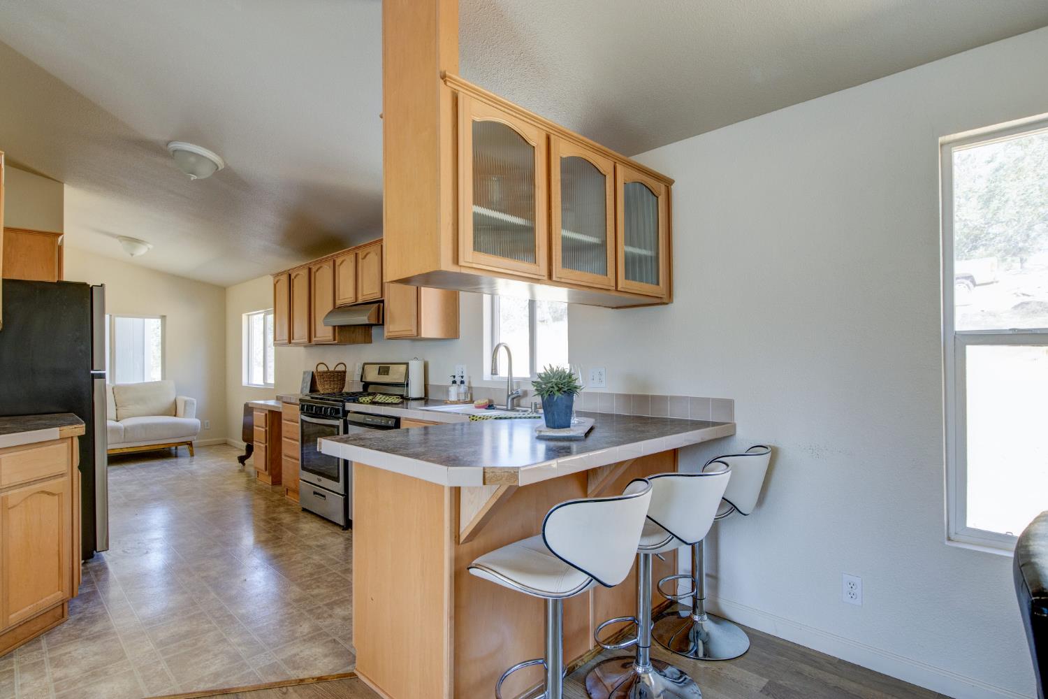 4991 Yuma Court, Unit 1829 Copperopolis, CA 95228 - Photo 18 of 45 Breakfast Bar . A good amount of cabinetry for storage.