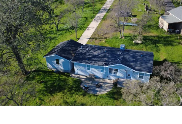 a black and white photo of a house