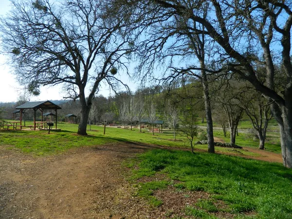 a front view of a building with a swimming pool
