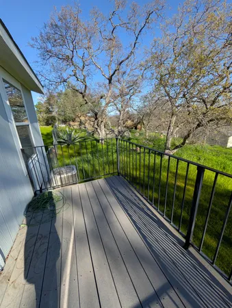 a backyard of a house with lots of green space