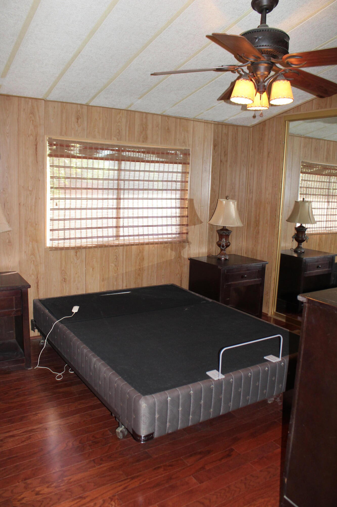 81641 Ave 48, Unit 95 Indio, CA 92201 - Photo 11 of 25 a living room with wooden floor furniture and a window