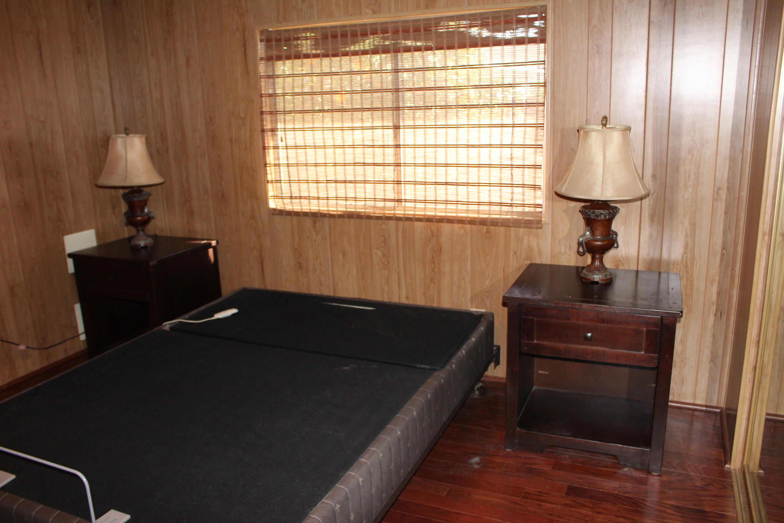 81641 Ave 48, Unit 95 Indio, CA 92201 - Photo 12 of 25 a room with a bed and a window