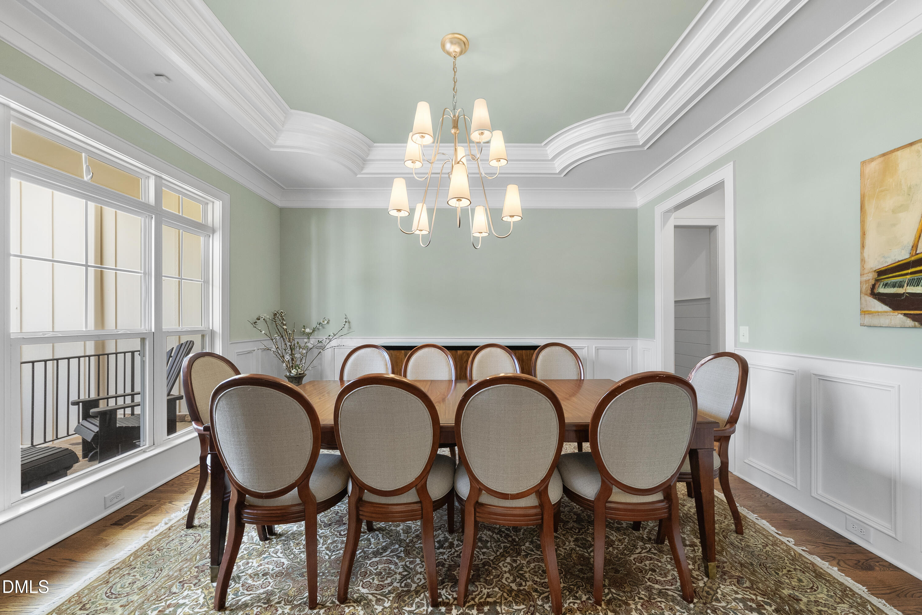5109 Wainscott Way Raleigh, NC 27612 - Photo 5 of 52 a view of a dining room with furniture window and outside view
