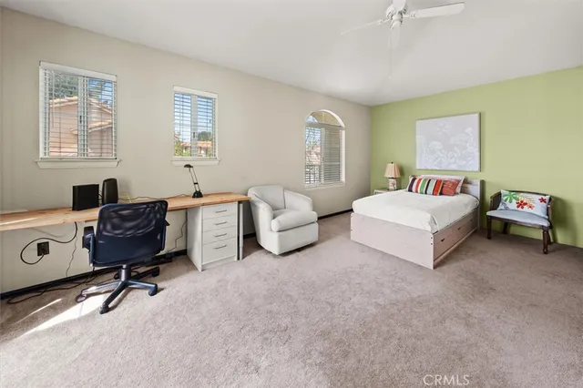 a view of a two chairs and table in the balcony