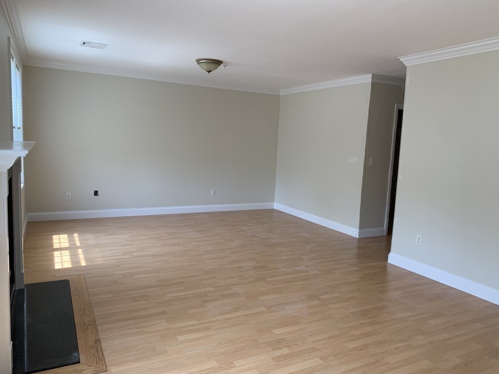 3 Dansereau Place, Unit 3 Middleton, MA 01949 - Photo 27 of 34 a view of an empty room