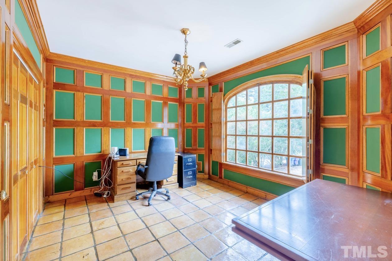 4205 Swarthmore Road Durham, NC 27707 - Photo 11 of 33 a bedroom with furniture and a window