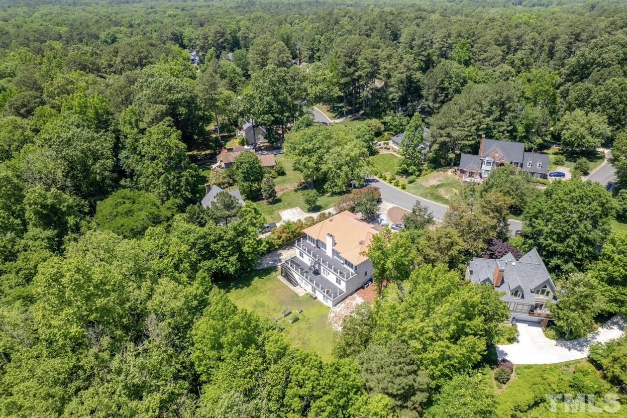 4205 Swarthmore Road Durham, NC 27707 - Photo 2 of 33 an aerial view of residential house with outdoor space and trees all around