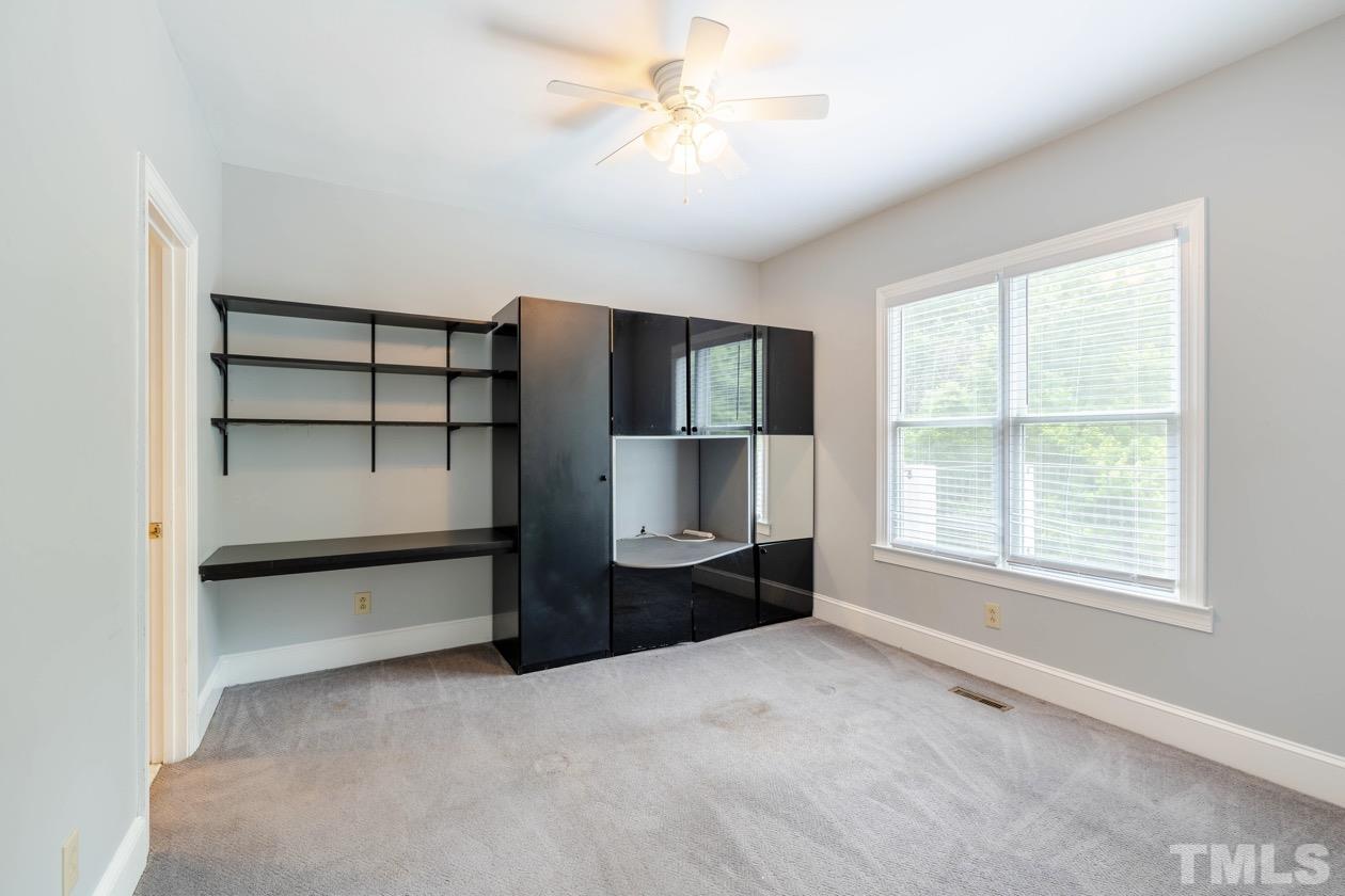 4205 Swarthmore Road Durham, NC 27707 - Photo 21 of 33 a view of workspace with window and a cabinet