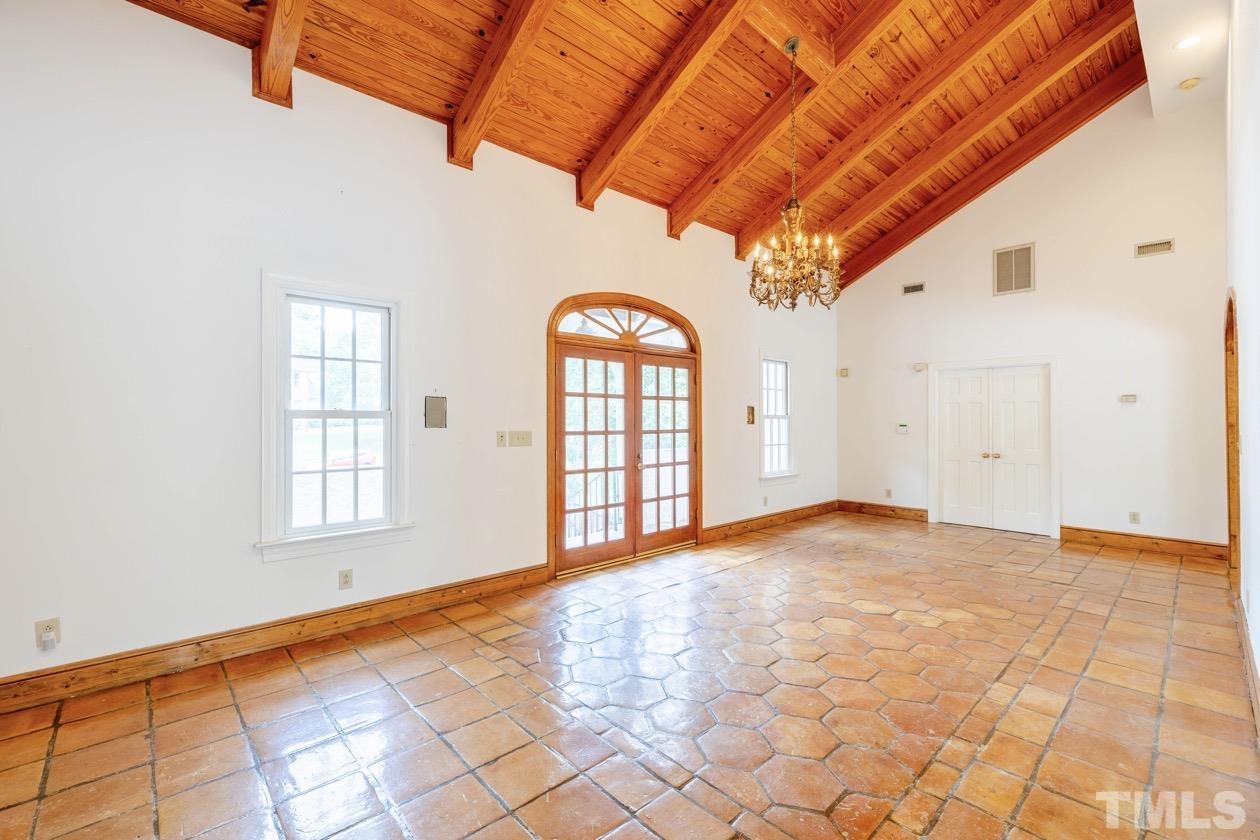 4205 Swarthmore Road Durham, NC 27707 - Photo 4 of 33 a view of an empty room with a window
