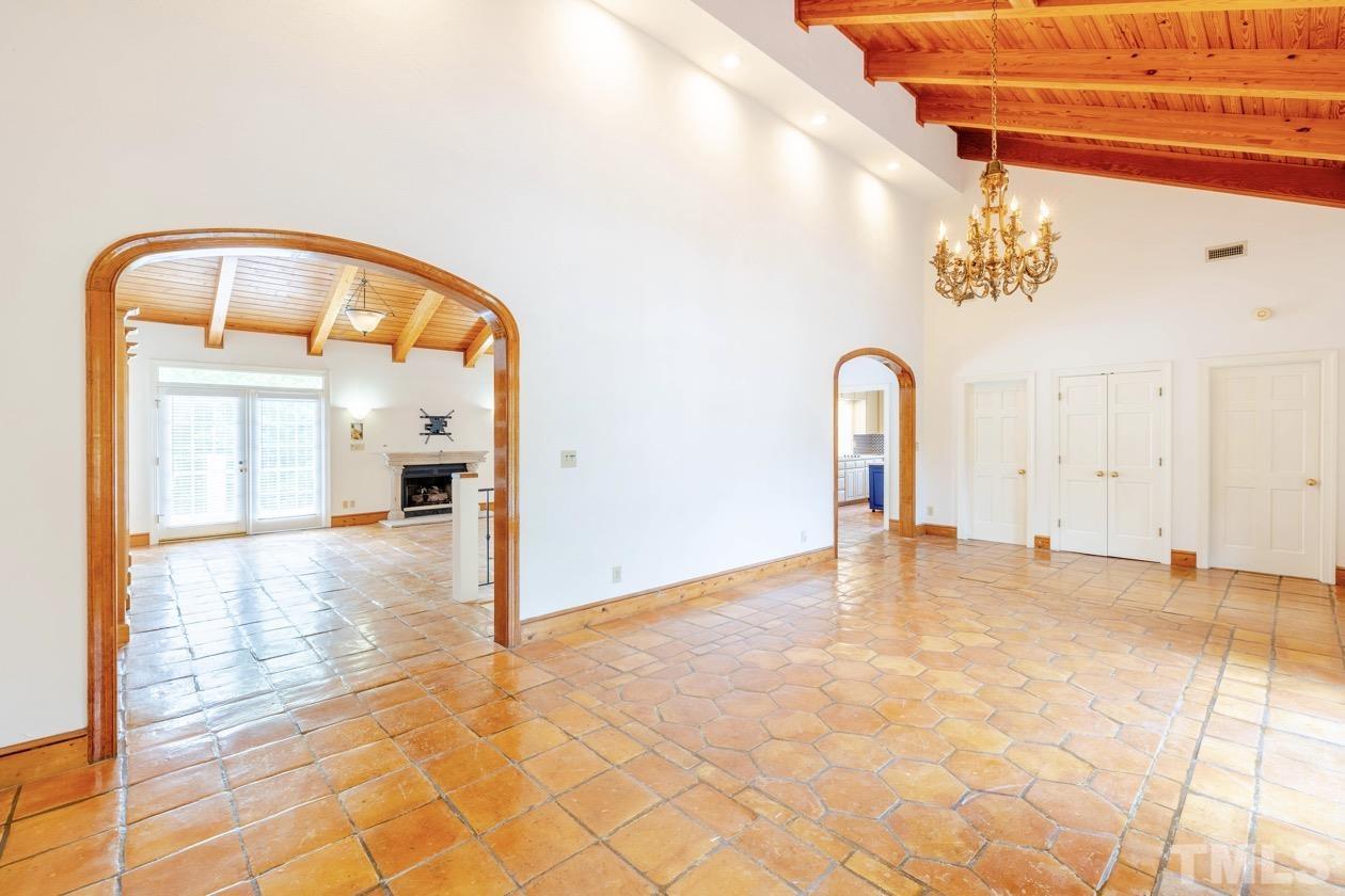 4205 Swarthmore Road Durham, NC 27707 - Photo 5 of 33 a view of empty room with a white door