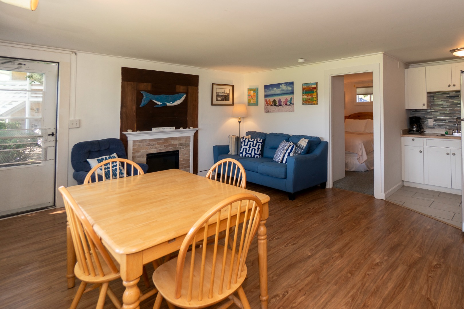 27 Island Inn Road, Unit 10C Oak Bluffs, MA 02557 - Photo 5 of 30 anor view of livingroom with fireplace
