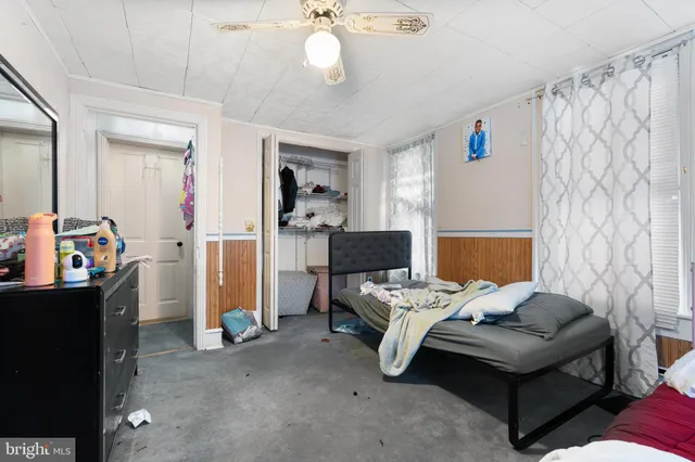 a kitchen with window and cabinets