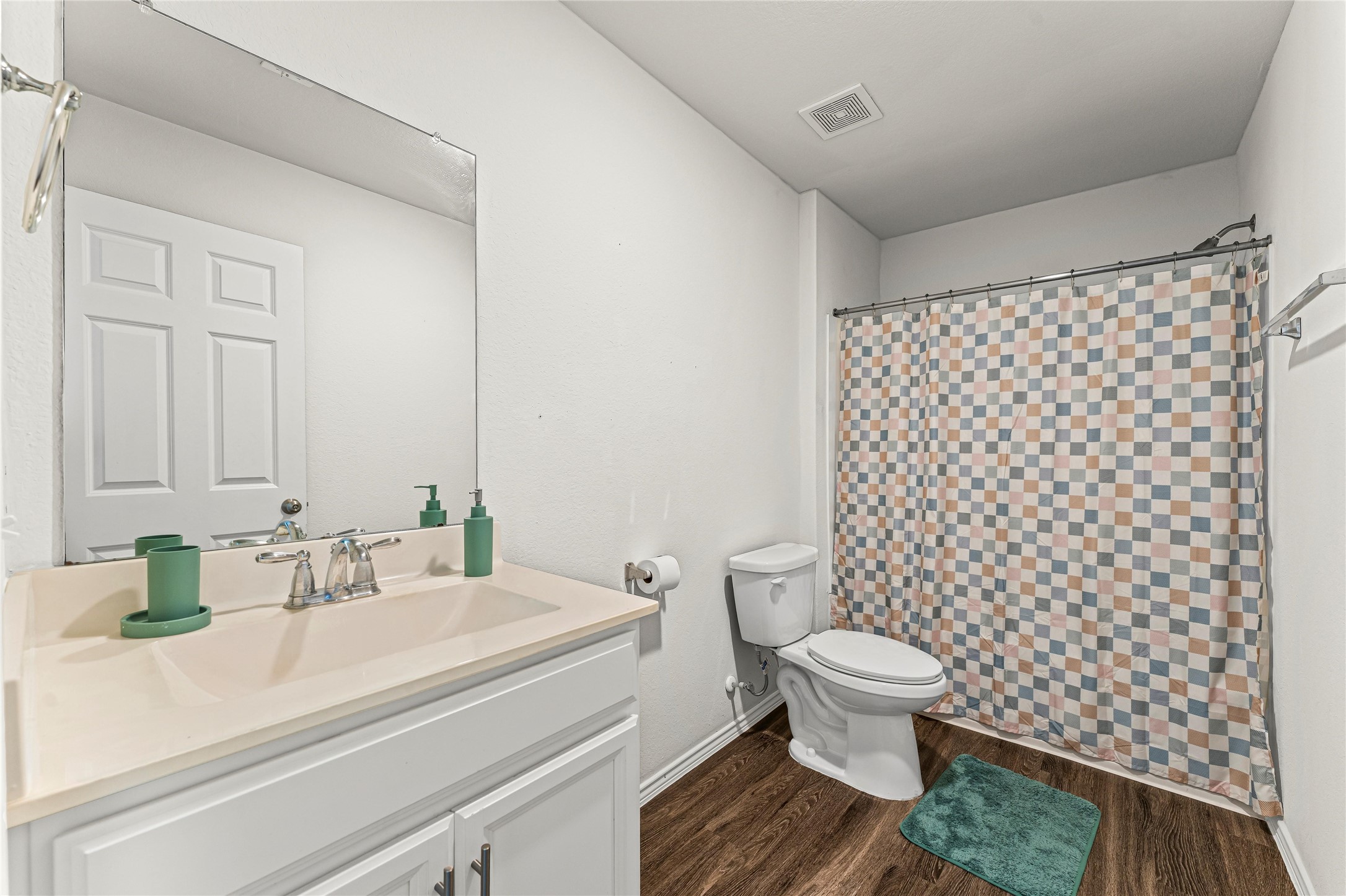 5826 Savanna Pasture Road Katy, TX 77493 - Photo 11 of 45 a bathroom with a sink toilet and shower