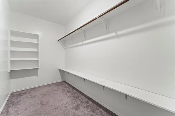 a bathroom with a sink and shower