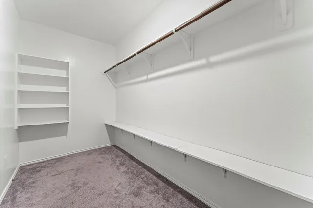 a bathroom with a sink and shower