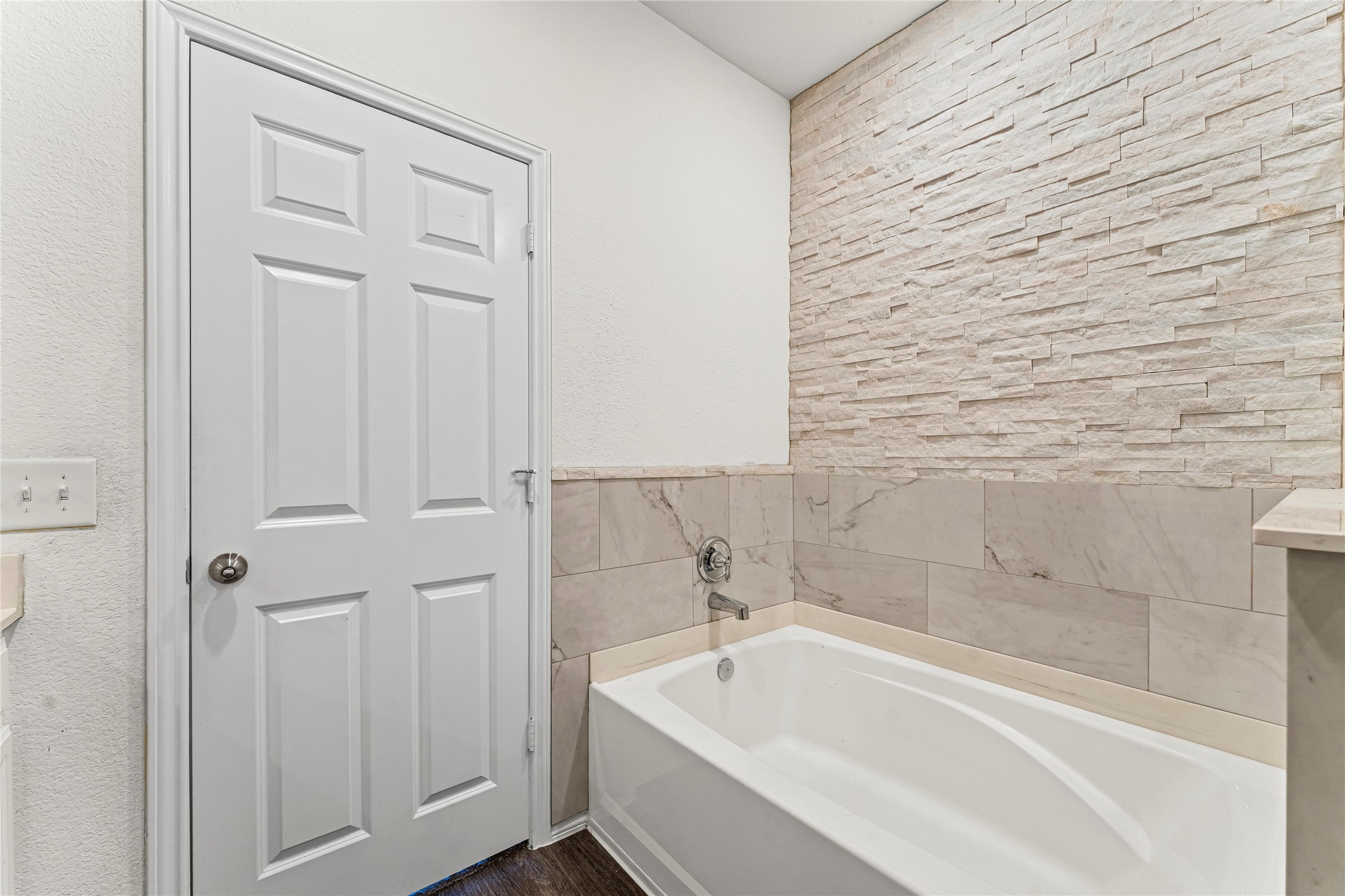 5826 Savanna Pasture Road Katy, TX 77493 - Photo 20 of 45 a bathroom with a tub and shower