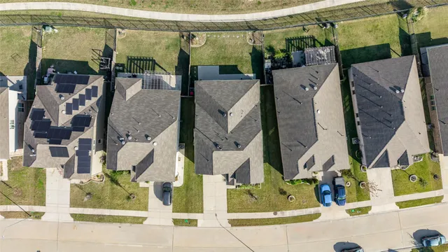 an aerial view of a building with wooden floor