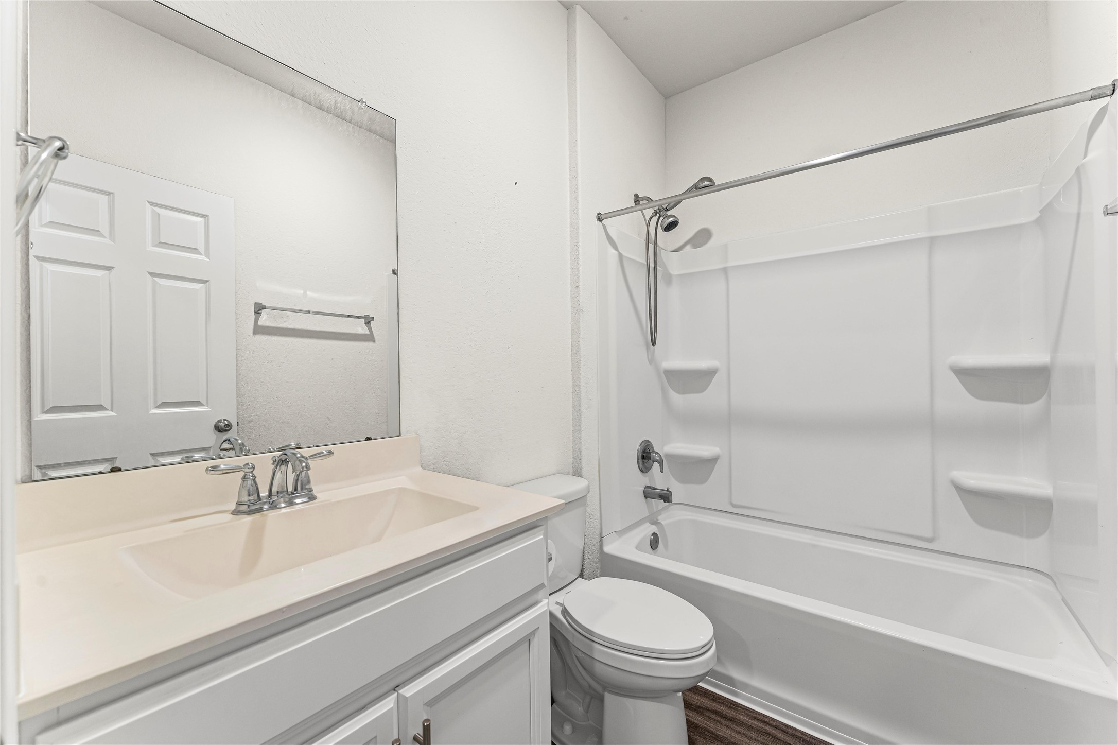 5826 Savanna Pasture Road Katy, TX 77493 - Photo 7 of 45 a bathroom with a sink a toilet and a bathtub