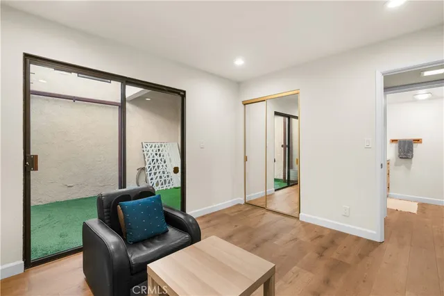 a living room with furniture and a gate
