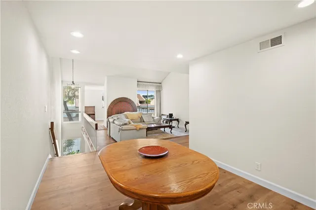 a view of a livingroom with furniture and bedroom