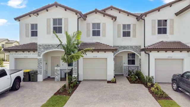 a view of a city with tall buildings