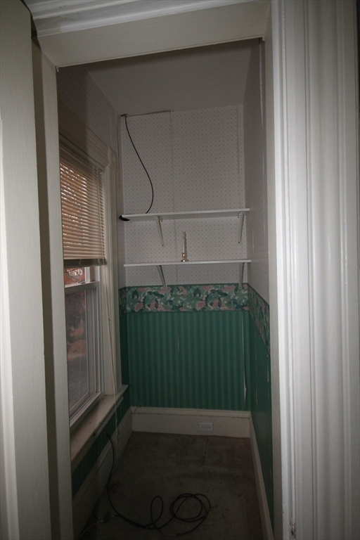 104 St James Avenue, Unit 2 Holyoke, MA 01040 - Photo 11 of 14 a room with a wooden floor and a sink