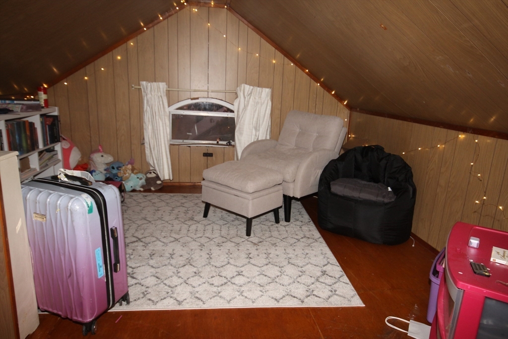 104 St James Avenue, Unit 2 Holyoke, MA 01040 - Photo 13 of 14 a living room with furniture and a rug