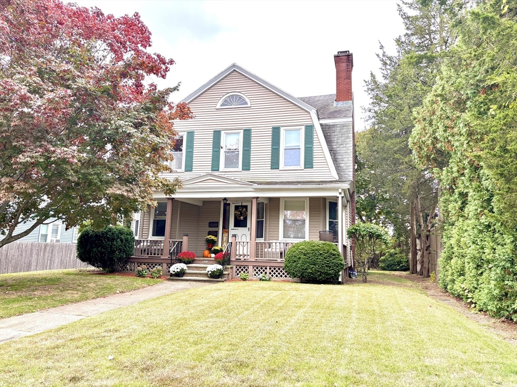 104 St James Avenue, Unit 2 Holyoke, MA 01040 - Photo 3 of 14 a front view of a house with yard and outdoor seating