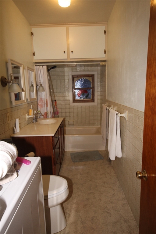 104 St James Avenue, Unit 2 Holyoke, MA 01040 - Photo 8 of 14 a bathroom with a sink toilet and shower