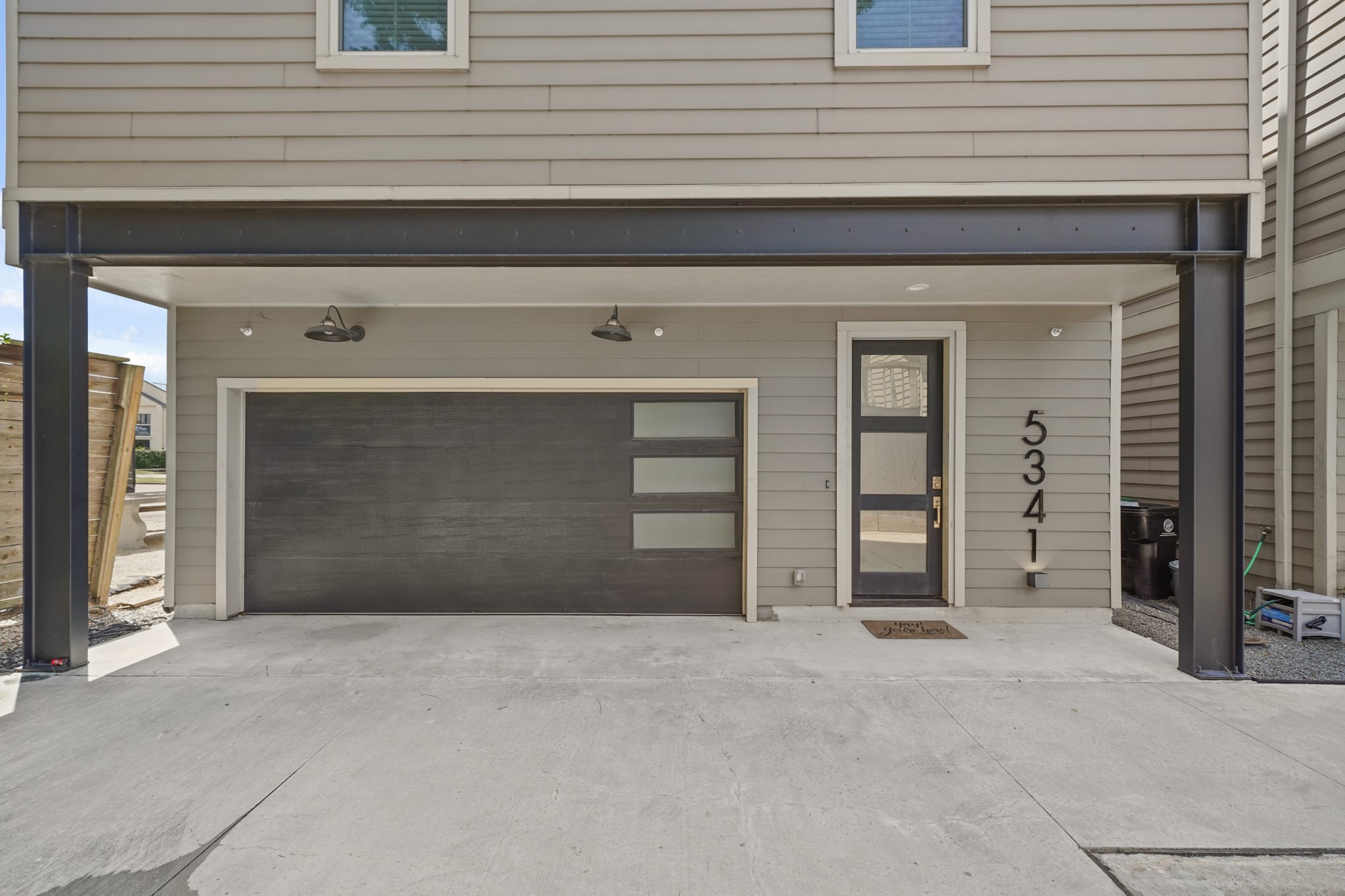 5345 Larkin Street Houston, TX 77007 - Photo 18 of 21 2 car garage with room to park a 3rd car at the end of the private gated driveway!
