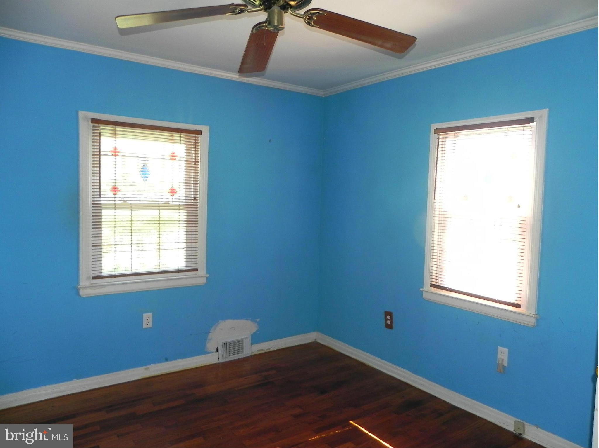 4509 Bennion Road Silver Spring, MD 20906 - Photo 4 of 18 a room with window and a wooden floor