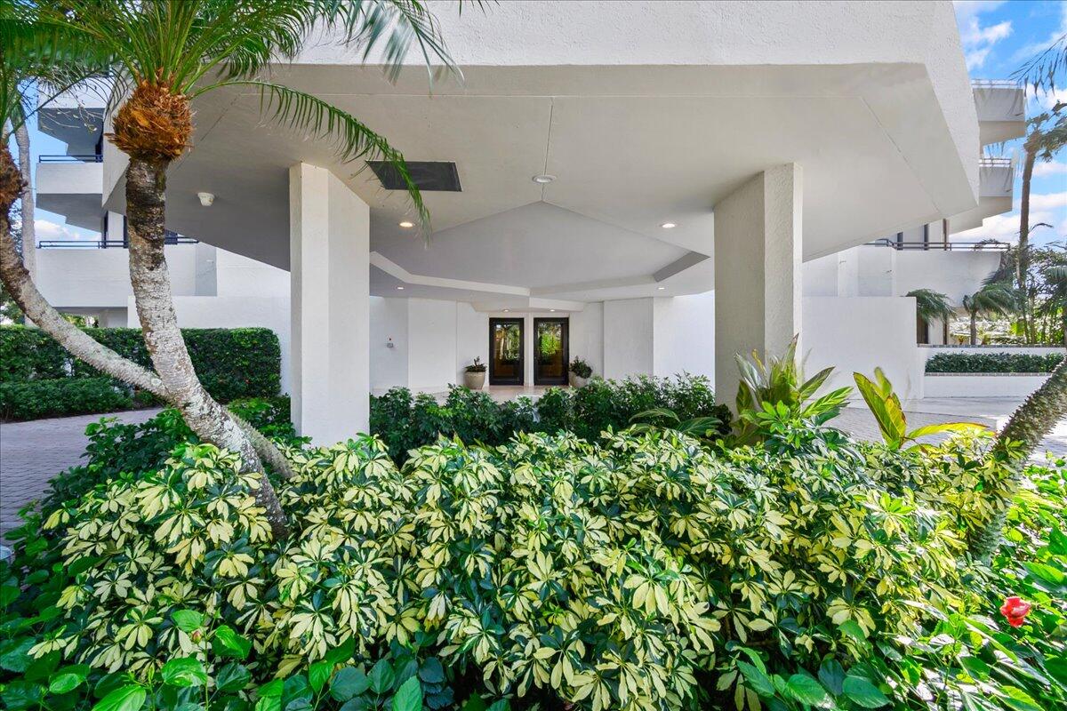 3322 Casseekey Island Road, Unit 201 Jupiter, FL 33477 - Photo 25 of 40 Porte Cochere