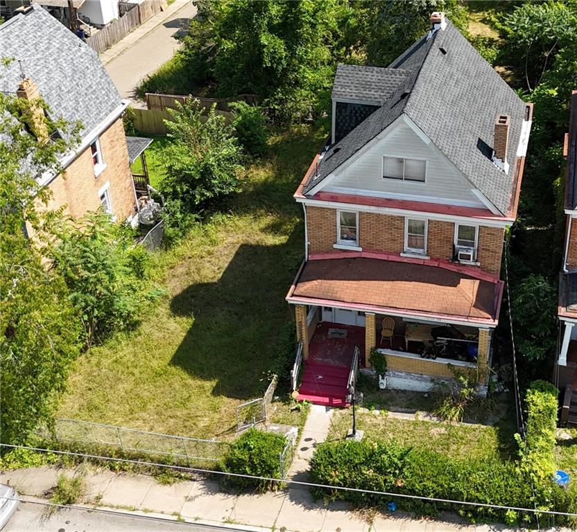412-414 West Prospect Avenue Pittsburgh, PA 15205 - Photo 2 of 7 an aerial view of a house with a yard