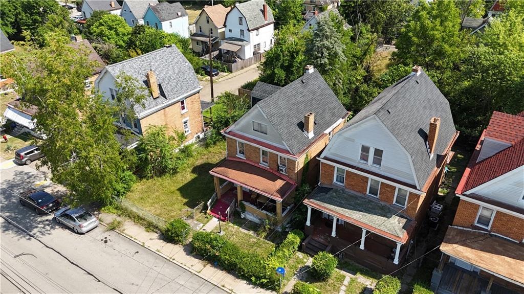 412-414 West Prospect Avenue Pittsburgh, PA 15205 - Photo 4 of 7 an aerial view of a house with a yard