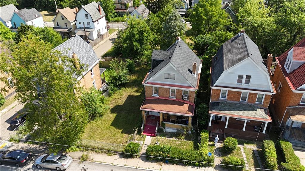 412-414 West Prospect Avenue Pittsburgh, PA 15205 - Photo 5 of 7 a view of multiple houses with a yard