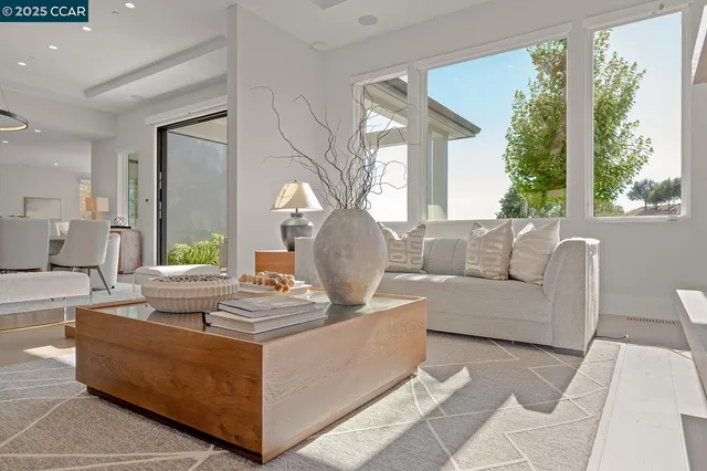 a spacious bedroom with a large bed and a couch