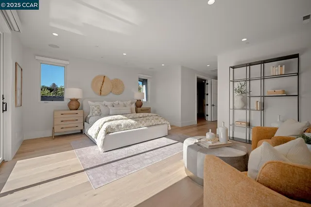 a living room with couch and a large window