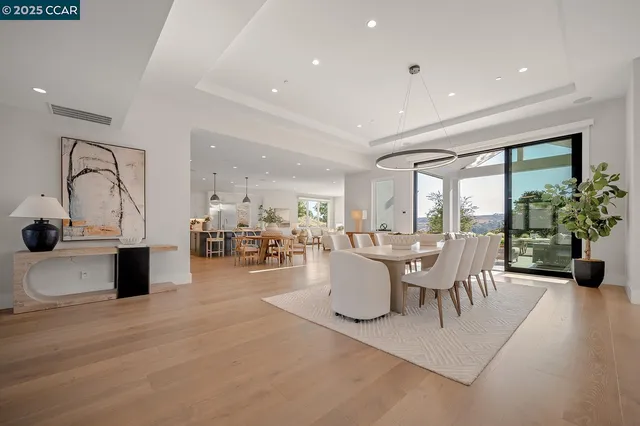 a kitchen with a sink stainless steel appliances and cabinets