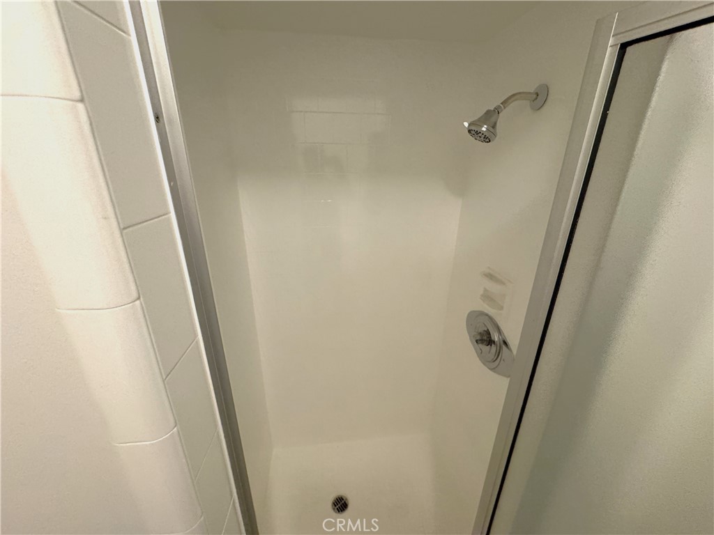44450 Lowtree Avenue Lancaster, CA 93534 - Photo 12 of 24 a bathroom with a shower