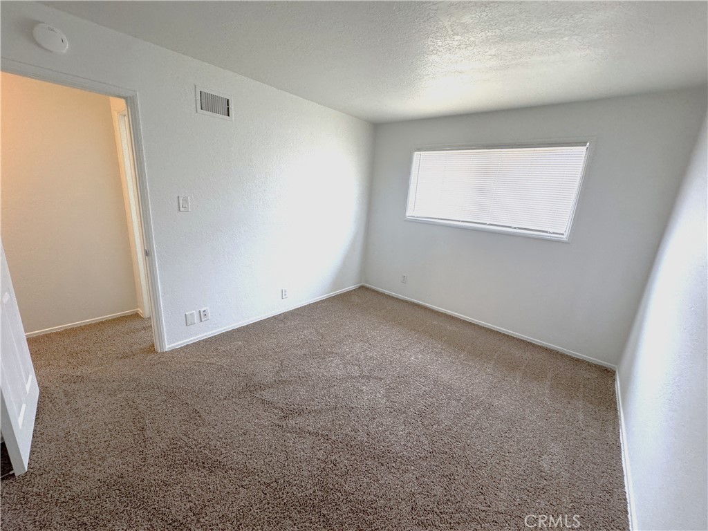 44450 Lowtree Avenue Lancaster, CA 93534 - Photo 20 of 24 an empty room with windows