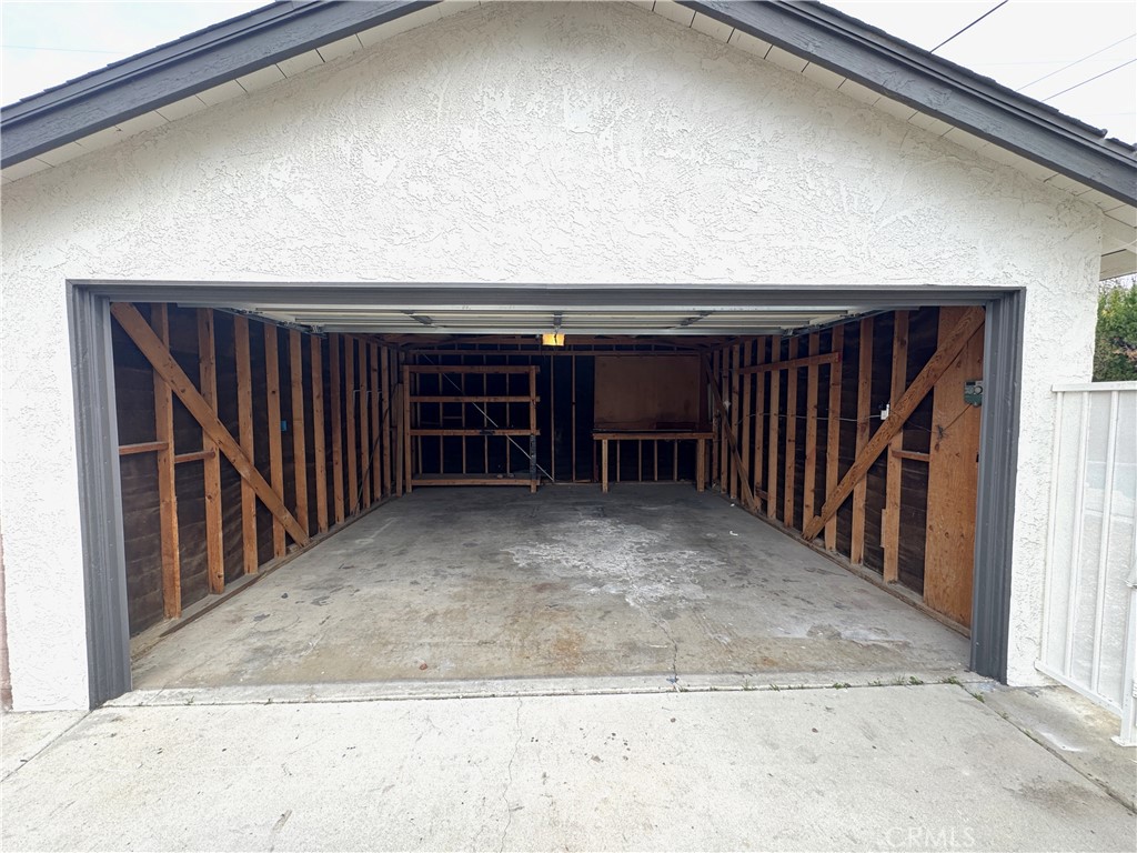44450 Lowtree Avenue Lancaster, CA 93534 - Photo 22 of 24 a view of a livingroom with wooden deck and furniture