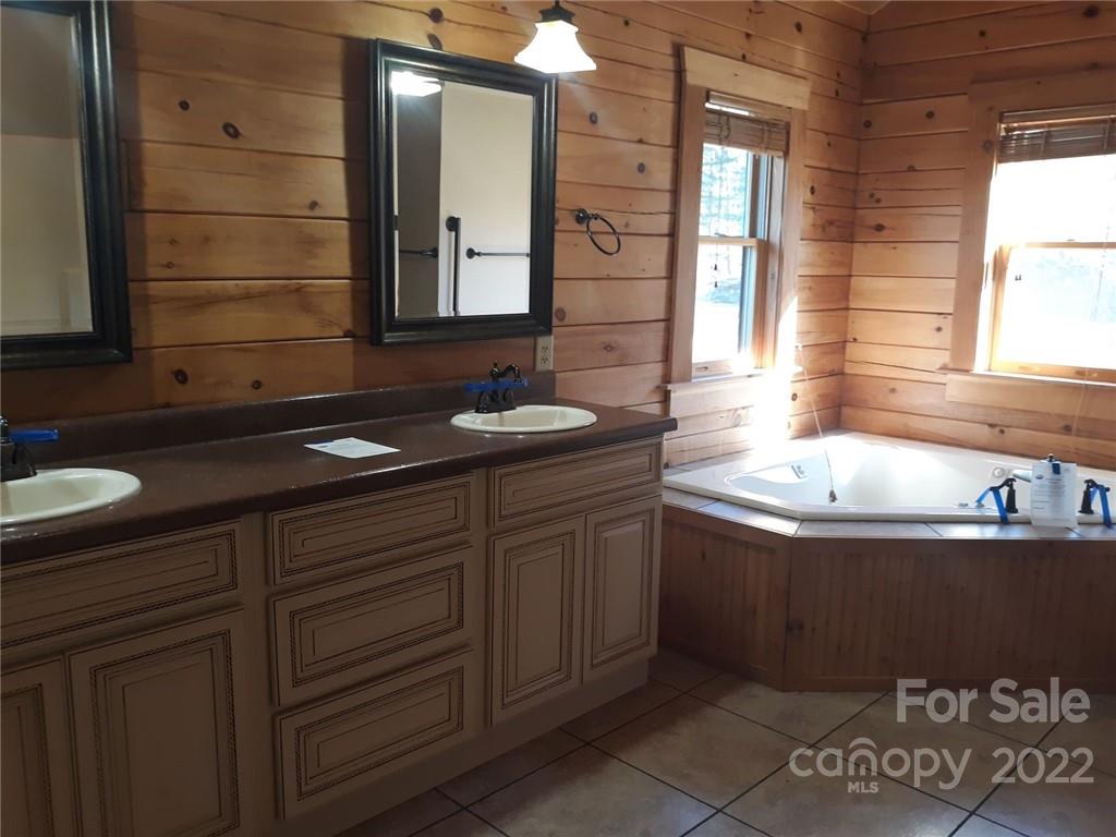 524 Freemantown Road Rutherfordton, NC 28139 - Photo 17 of 43 a bathroom with a sink and a mirror