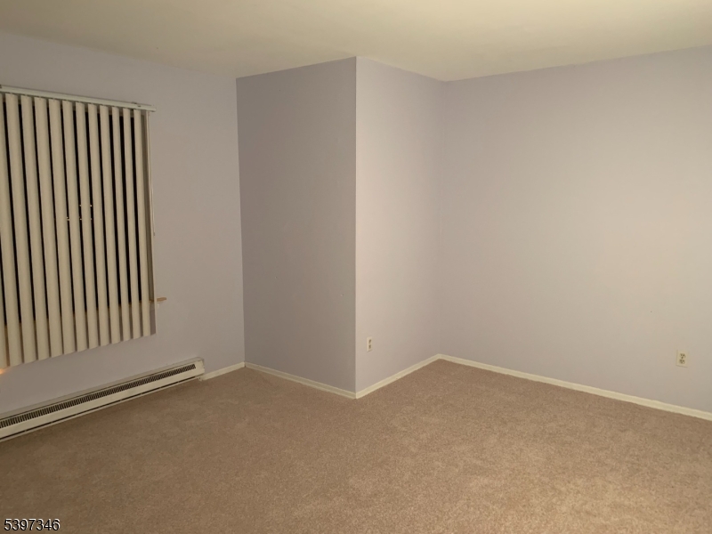 597 Auten Road Hillsborough, NJ 08844 - Photo 3 of 9 an empty room with a window