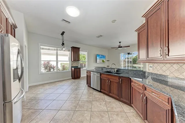 a bathroom with a shower and a sink