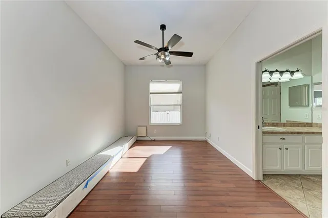 a view of a backyard with a swimming pool