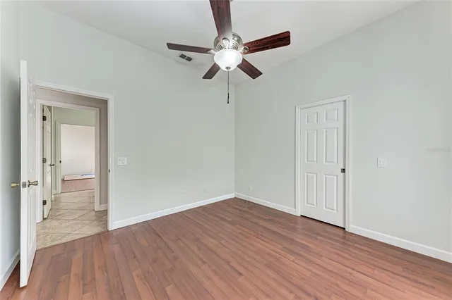 an aerial view of a house with a swimming pool yard and outdoor seating