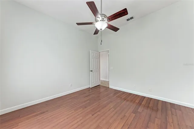 an aerial view of residential houses with outdoor space and swimming pool