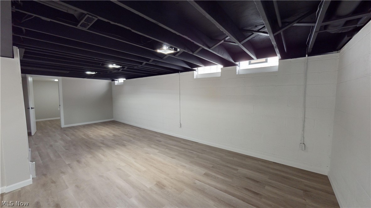 1224 Cordova Road Mayfield Heights, OH 44124 - Photo 25 of 29 Basement featuring light wood-type flooring